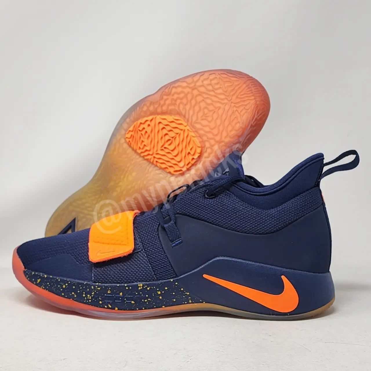 Paul george shops orange shoes